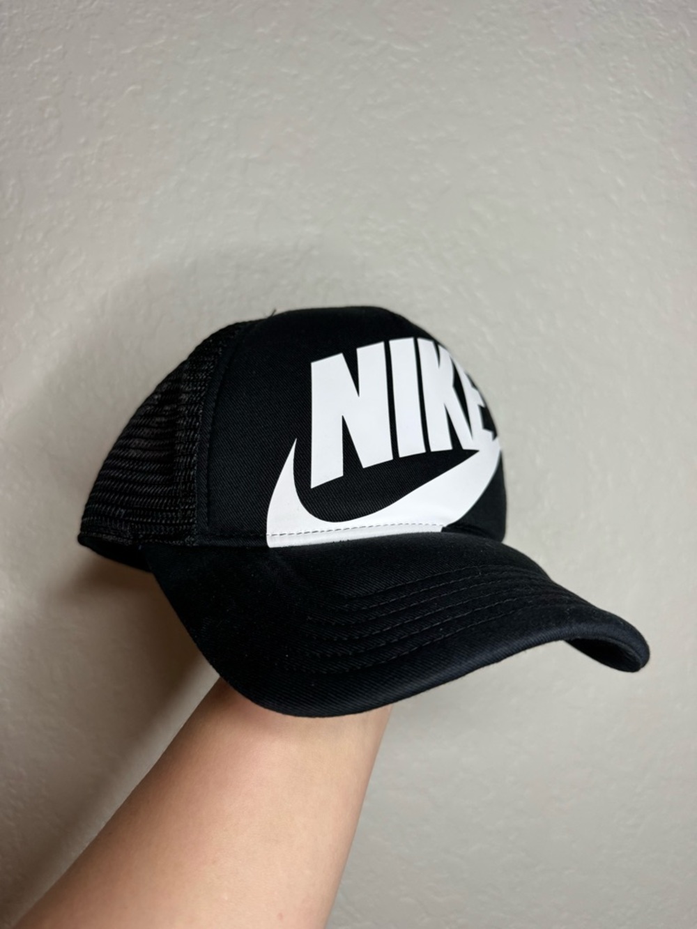 Nike Black Cap with White Swoosh Logo